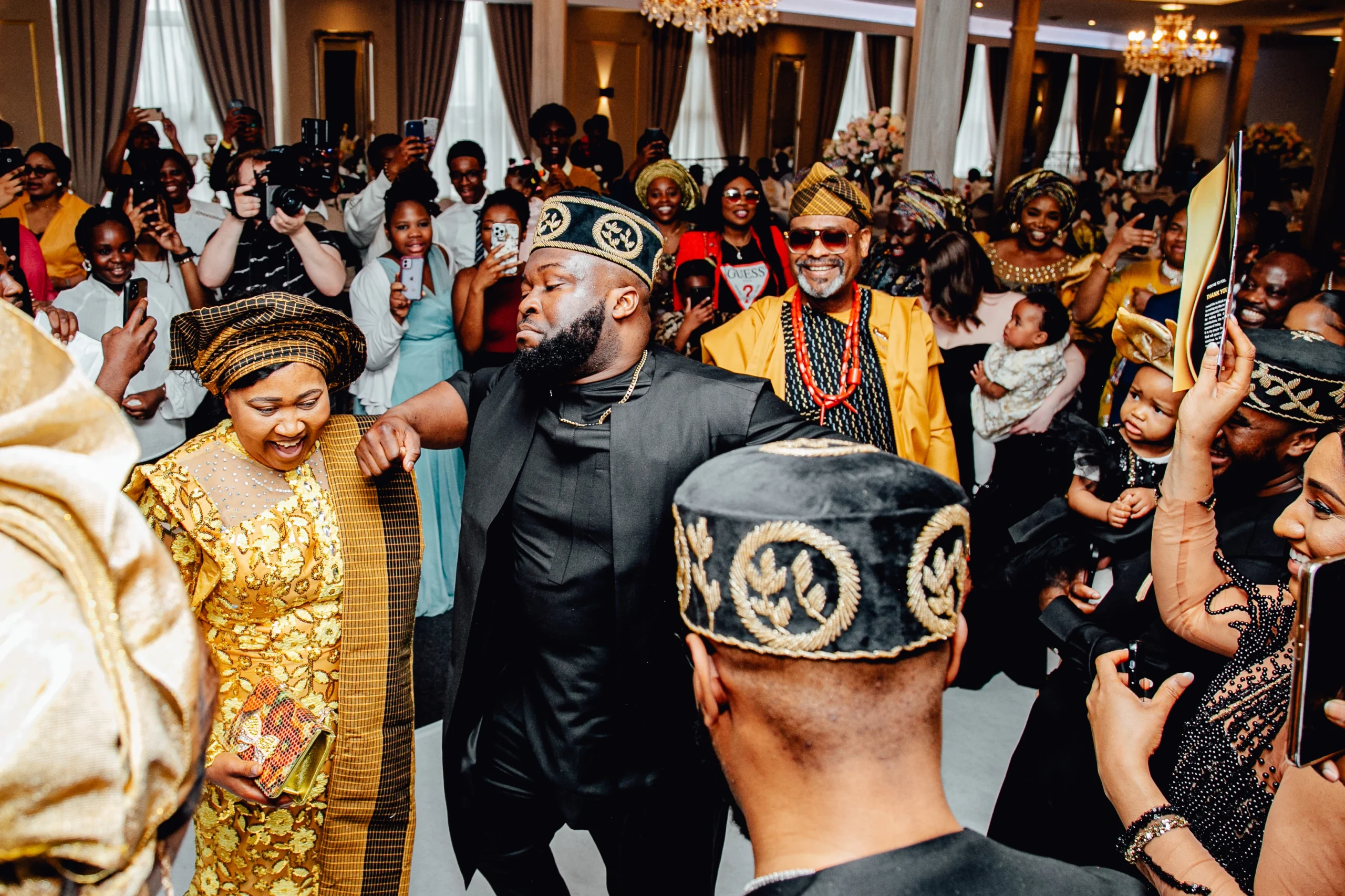 Guests celebrating a surprise 60th birthday party with live entertainment in Manchester UK