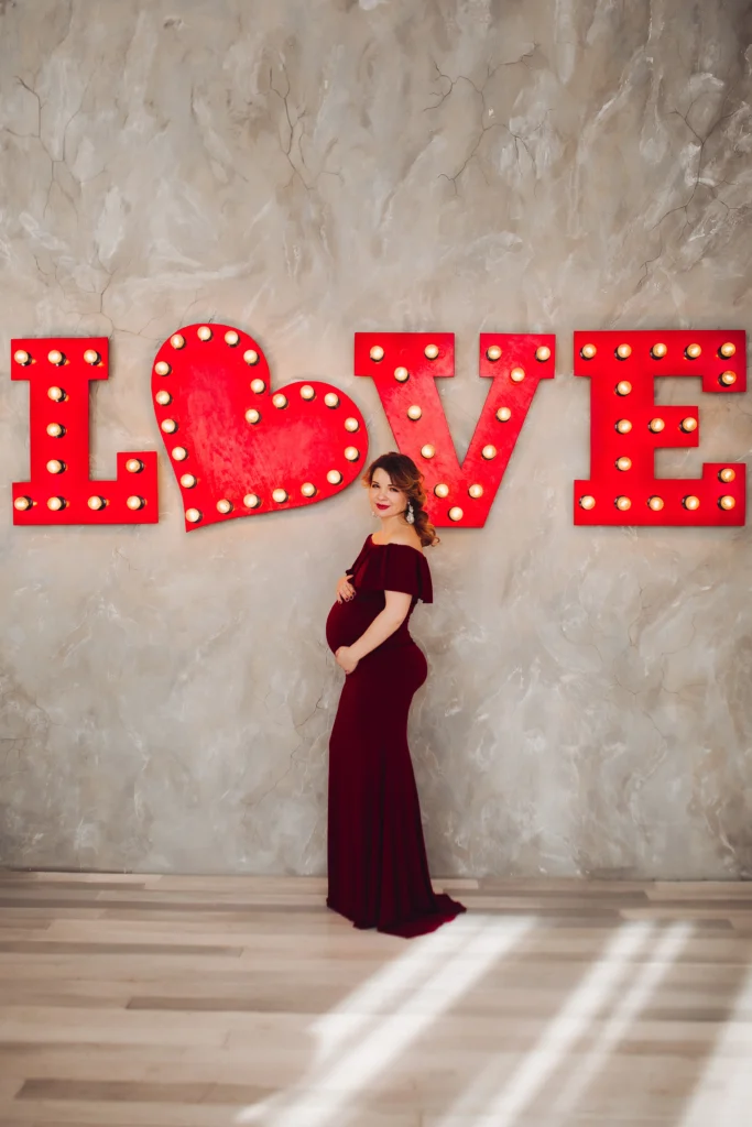 gorgeous-pregnant-woman-wearing-marsala-dress-posing-touching-her-belly-beautiful-future-mother-standing-steps-white-house-concept-maternity-motherhood