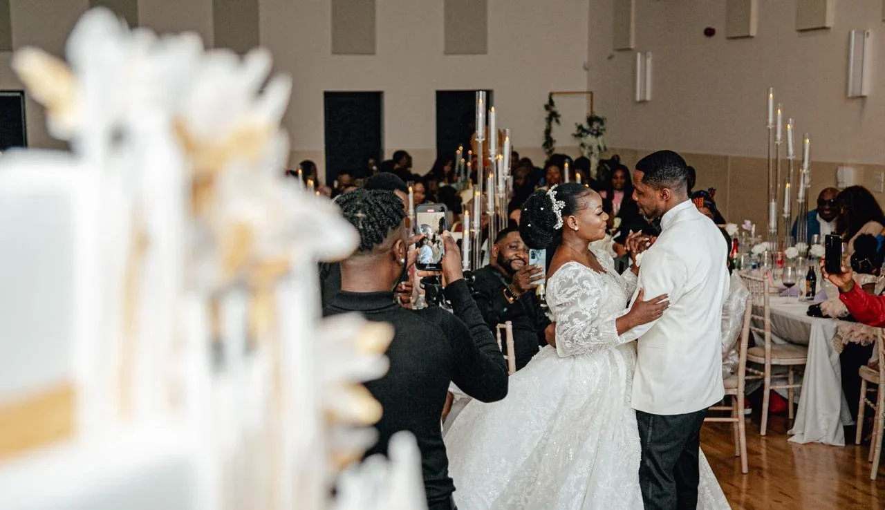 Bride and groom sharing their first dance during a wedding reception celebration