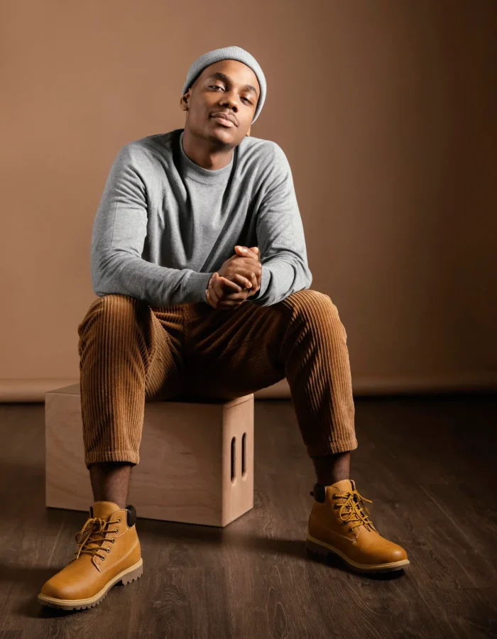 portrait-male-wearing-cap-sitting