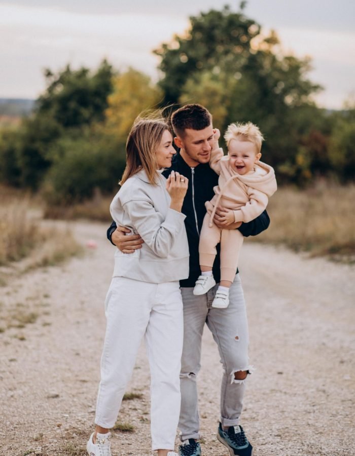 Young family together with little son